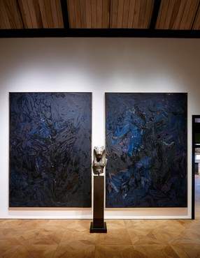 Installation view, Georg Baselitz, Peter Marino Art Foundation, Southampton, New York, May 20–September 30, 2023. Artwork, front to back: fourteenth-century statue of the Egyptian goddess Sekhmet, © Georg Baselitz 2023