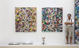 Takashi Murakami with his dog, Pom, Full Steam Ahead, Dark Matter in the Farthest Black Reaches of Visible Space, and Blue Flowers & Skulls (all 2012), Kaikai Kiki Co., Ltd., studio, Saitama, Japan, 2012
