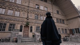 Setsuko in front of the Grand Chalet de Rossinière in Switzerland where she lives and works.