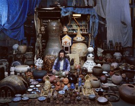 Takashi Murakami with works from his ceramics collection.